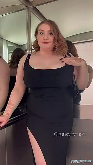 A Date Night Flash: A Curvy Woman in a Black Dress'